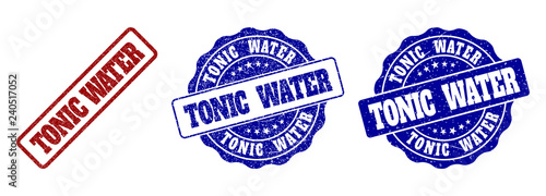 TONIC WATER grunge stamp seals in red and blue colors. Vector TONIC WATER labels with dirty surface. Graphic elements are rounded rectangles, rosettes, circles and text labels.