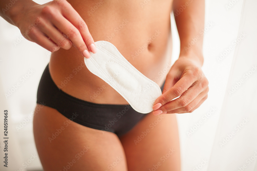 Closeup Of Beautiful Woman Body In Underwear Holding Panty Liner Stock  Photo