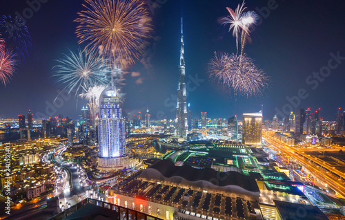 Fototapeta Fireworks display at town square of Dubai downtown