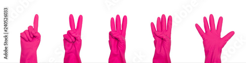 Signs made of pink protective gloves. Fingers symbol one two three four five. Isolated on white. The concept of cleanliness and order.