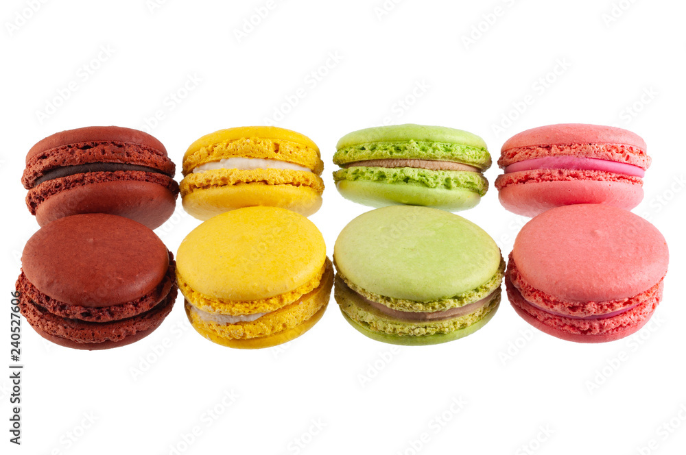 Fototapeta premium Macaron cakes of different colors isolated on a white background