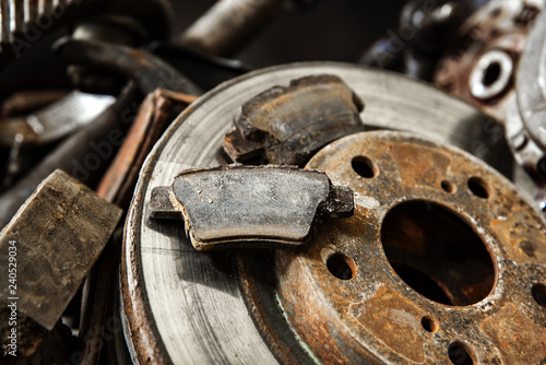 old rusty car parts with shallow depth of field