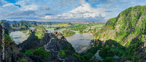 Hang Mua (Mua Cave mountain) panoramic sunset view in Ninh Binh, VietNam photo