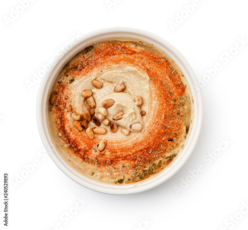Top view of hummus with pine nuts