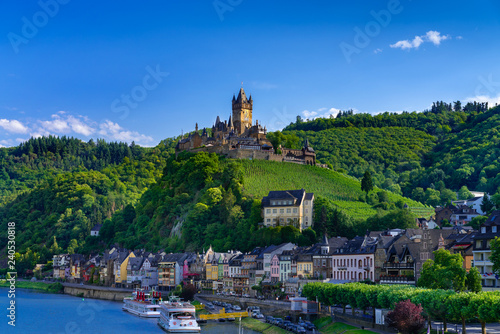 The town of Cochem, Germany, in the summer. It lies in the most romantic part of the Moselle Valley, where the river curves between two hiking paradises - Eifel and Hunsrück. photo