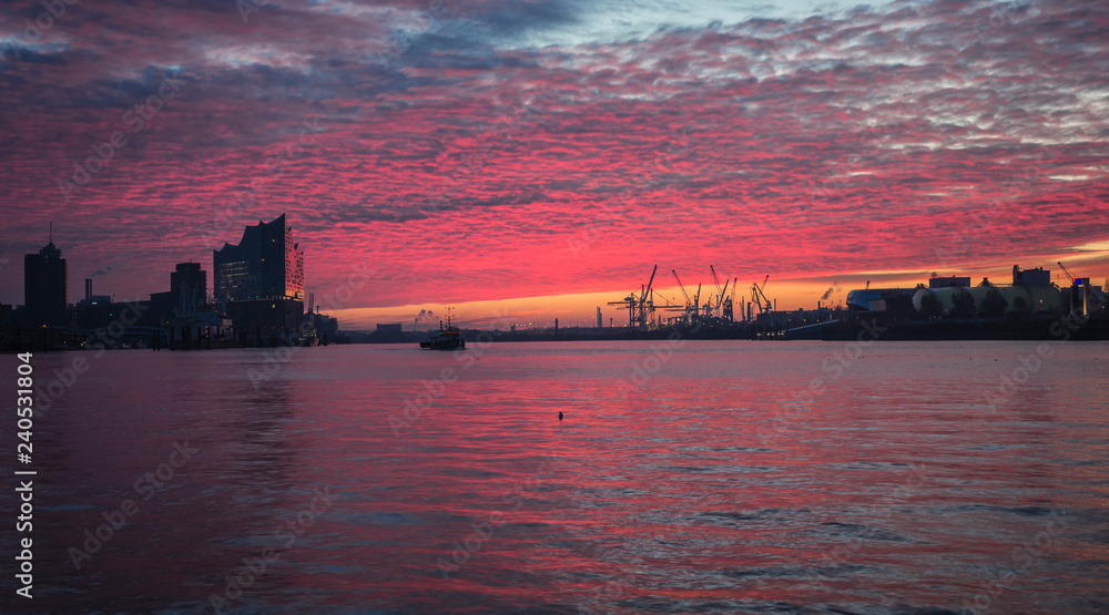 Sunrise on the riverside of Hamburg.