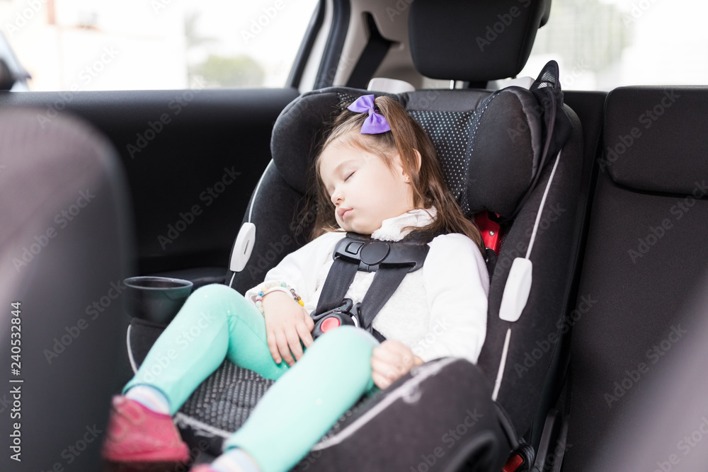 Girl Secured With Seat Belts Resting In Car Girl Secured With Seat Belts Resting In Car
