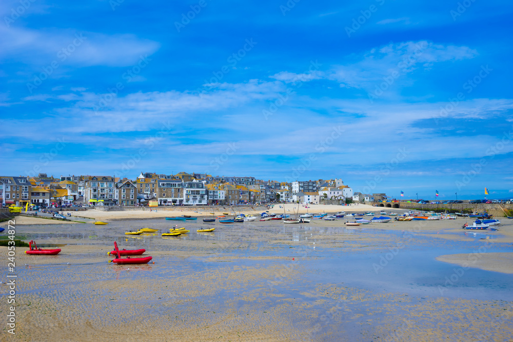 St. Ives, Cornwall,England, UK in the summer. View of the harbor at low tide.