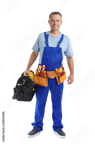 Electrician with tools wearing uniform on white background