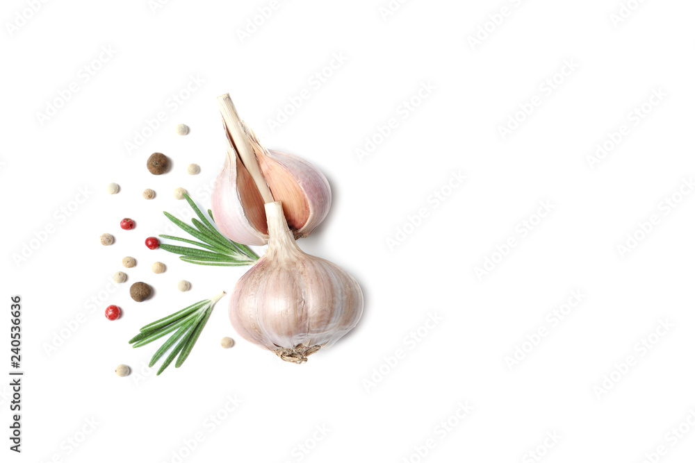 Composition with garlic and onion on white background, top view. Space for text - obrazy, fototapety, plakaty 