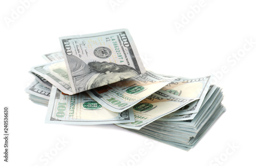 Many dollar banknotes on white background. National American currency