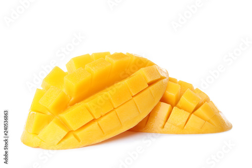 Fresh juicy mango halves on white background