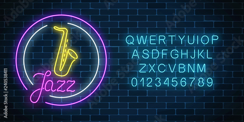 Neon jazz cafe with saxophone glowing sign with round frame and alphabet. Glowing street signboard of bar with karaoke.