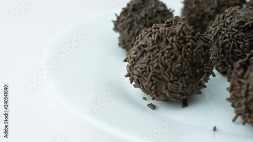Rum Truffles with Chocolate Sprinkles Spinning Side View