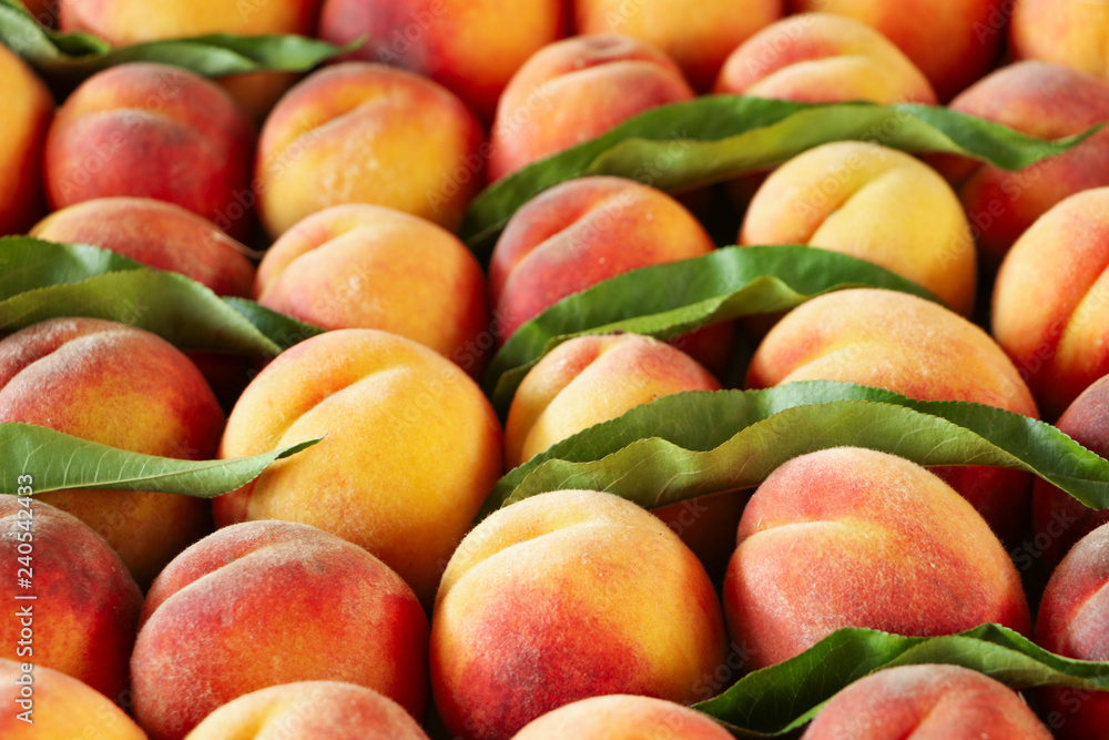 Ripe peaches on the market counter. Close-up. Ripe peaches on the market counter. Close-up.