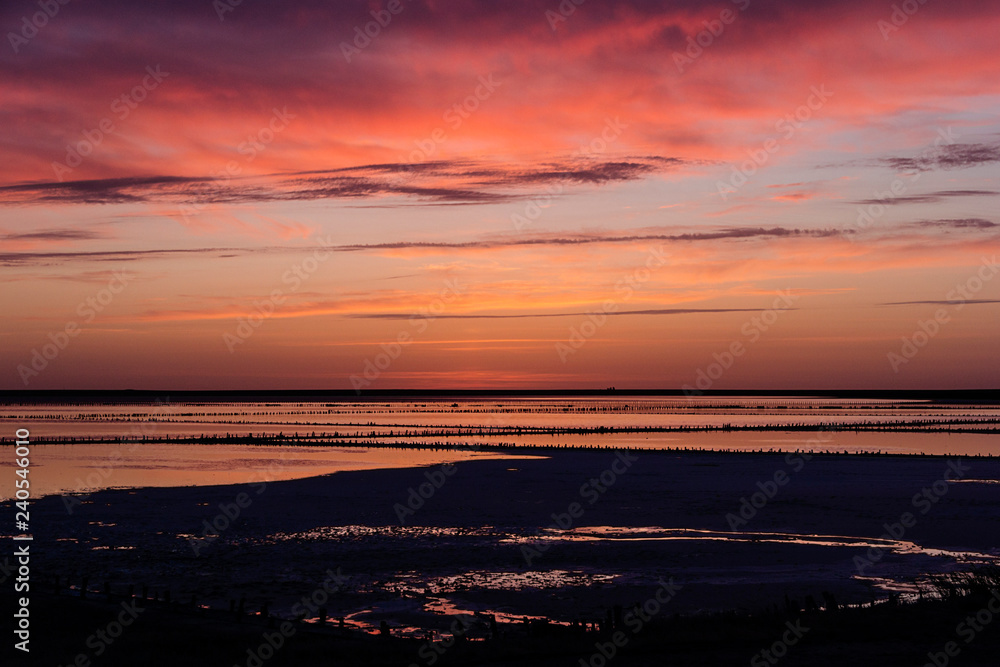 Sunset sky clouds. Delicate shades of the sunset sky