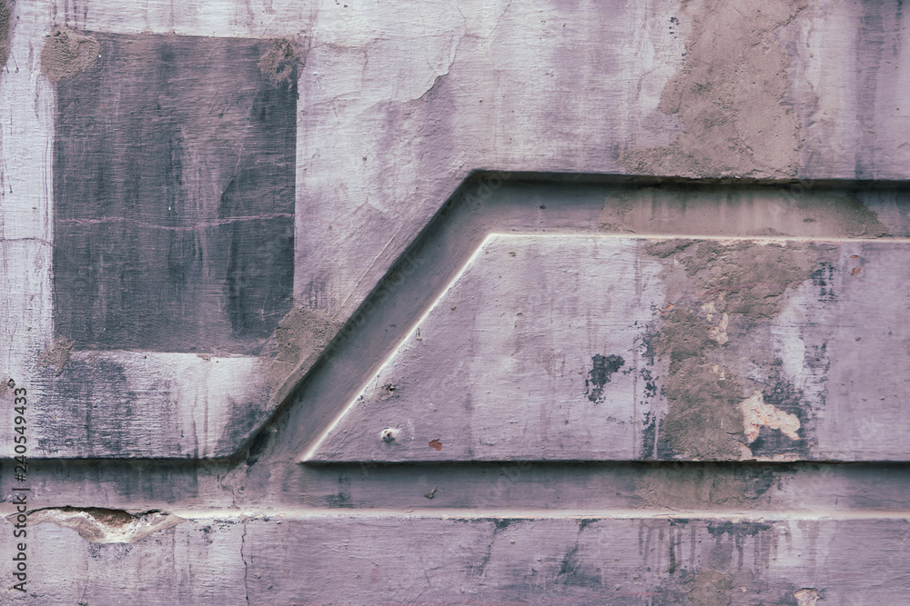 Purple concrete wall with a pattern of broken lines. Violet and empty background. Architectural minimalism. Purple concrete wall with a pattern of broken lines. Violet and empty background. Architectural minimalism.