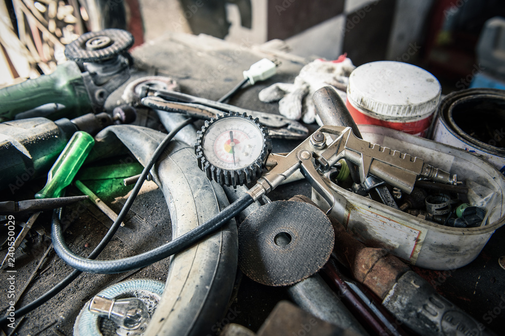 Fototapeta premium Technician checking air pressure car tire