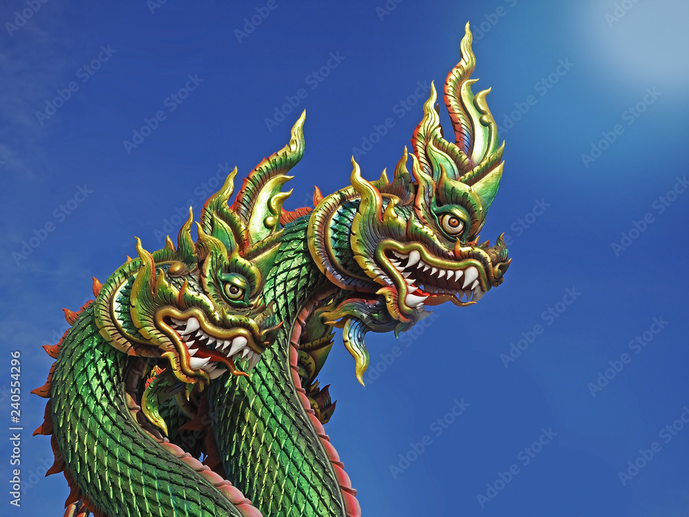 King of Nagas or Serpent statue with blue sky Thailand King of Nagas or Serpent statue with blue sky Thailand