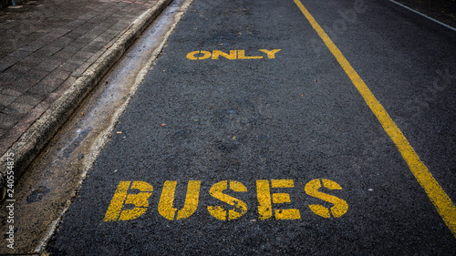 Buses Only sign painted on a road