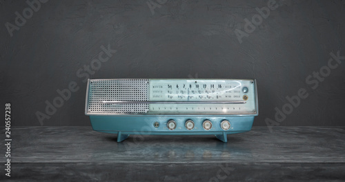 Tableau sur toile Old antique AM FM stereo radio isolated on cement wall and floor background