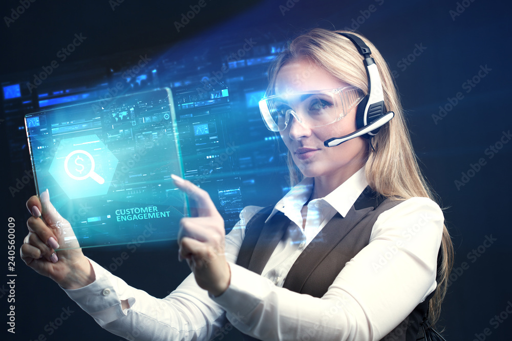 The concept of business, technology, the Internet and the network. A young entrepreneur working on a virtual screen of the future and sees the inscription: Customer engagement The concept of business, technology, the Internet and the network. A young entrepreneur working on a virtual screen of the future and sees the inscription: Customer engagement