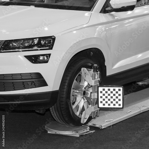 Computer stand to adjust the camber and toe of the car wheels