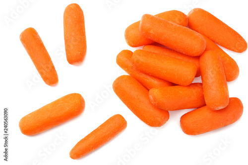 group of organic small baby carrots isolated on a white background. Top view