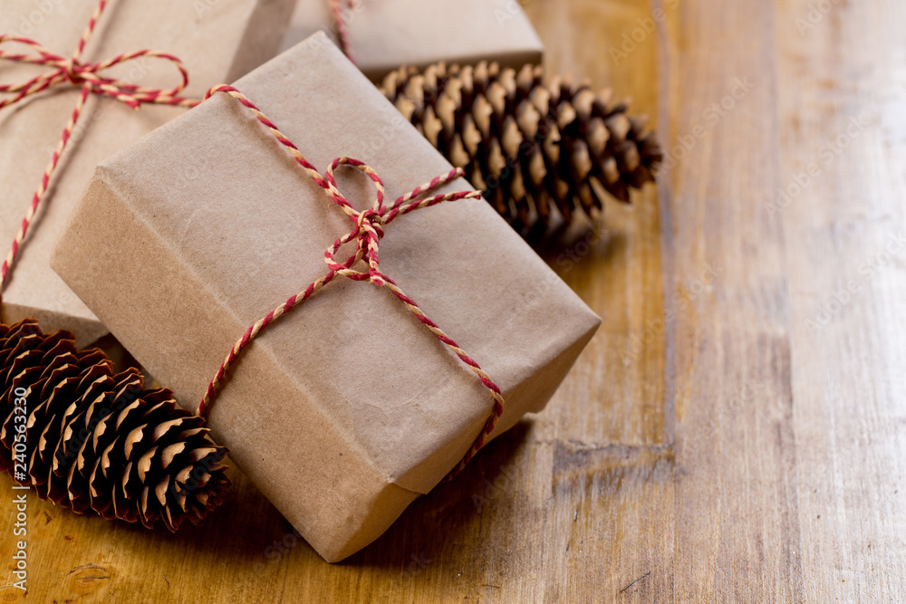 craft christmas presents on wooden background. craft christmas presents on wooden background.