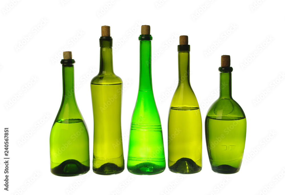 Wine bottles on a light background. A place for your text. Wine bottles on a light background. A place for your text.