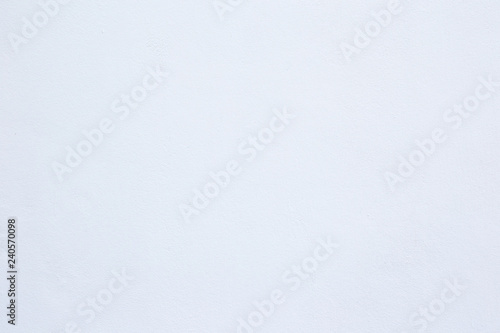 texture of a white wall. White Concrete Wall Background. Plastering brick wall painted by paper white color can be use as wall paper or texture background of white color.