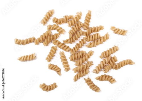 Wholemeal pasta isolated on white background, top view