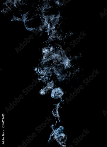 blue smoke on black background