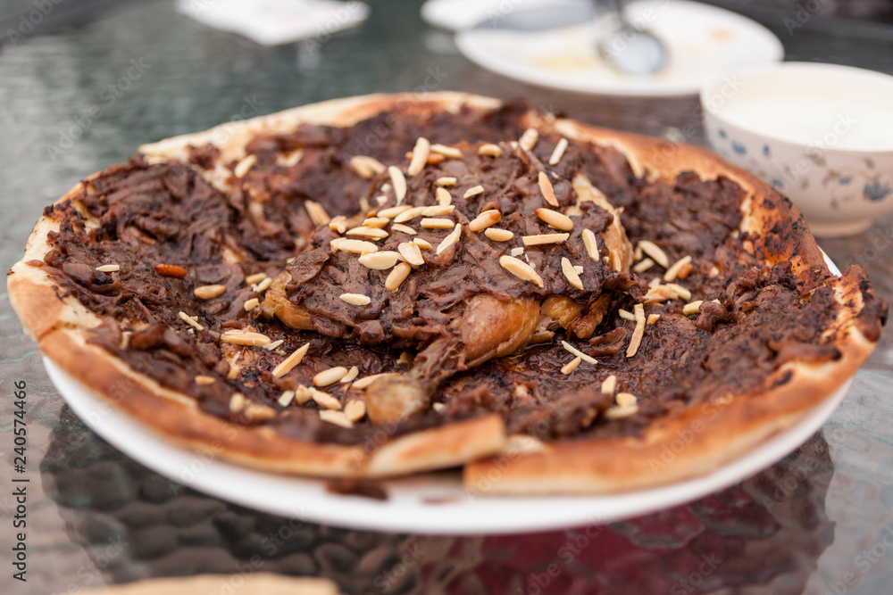 A Palestinian dish called musakhan served at a cafe in old Dubai, United Arab Emirates.