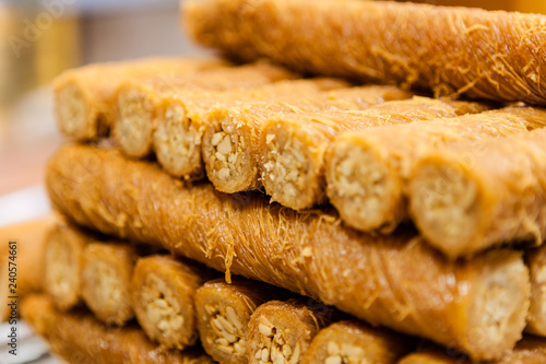 A tray of borma pistachio, a popular Middle Eastern dessert, in an Arabic bakery in Dubai, United Arab Emirates photo