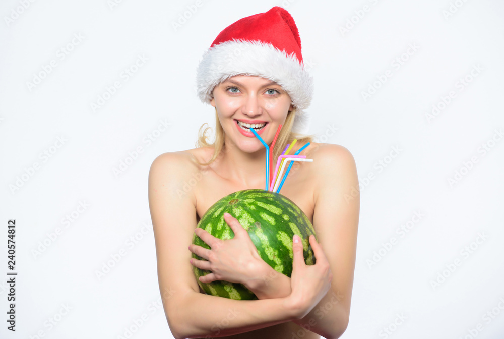 New year and christmas concept. Exotic christmas holidays. Girl attractive naked wear santa hat hug watermelon. Countries that celebrate christmas in summer. Tips to celebrate summer christmas New year and christmas concept. Exotic christmas holidays. Girl attractive naked wear santa hat hug watermelon. Countries that celebrate christmas in summer. Tips to celebrate summer christmas