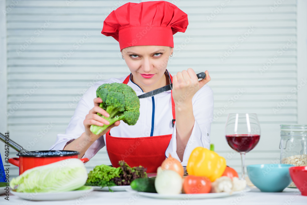 Free healthy vegetarian and vegan recipes. How to cook broccoli. Turn broccoli into favorite ingredient. Raw food diet. Broccoli nutrition value. Woman professional chef hold raw broccoli vegetable Free healthy vegetarian and vegan recipes. How to cook broccoli. Turn broccoli into favorite ingredient. Raw food diet. Broccoli nutrition value. Woman professional chef hold raw broccoli vegetable