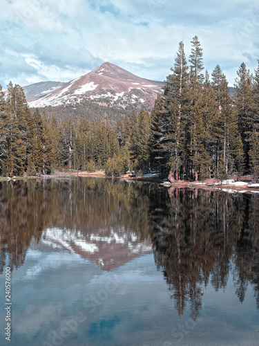 View of the Mammoth mountain and forest with reflection in the lake (California)