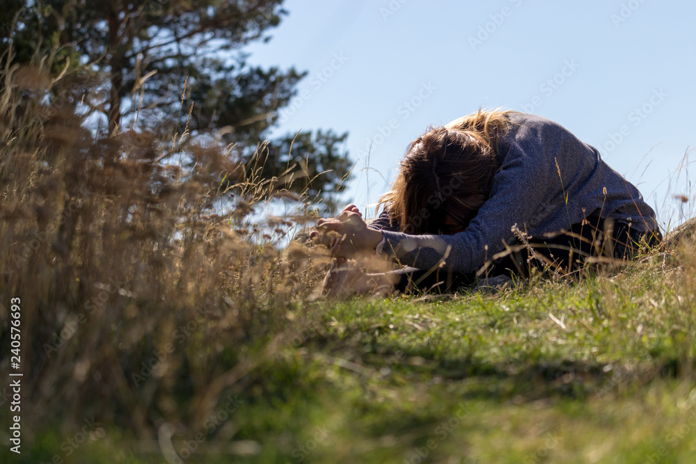 woman meditating in the mountain yoga style woman meditating in the mountain yoga style