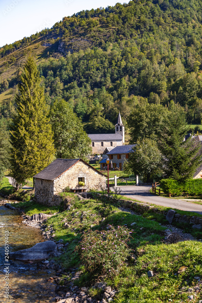 View of the village of Ustou in summer, Couserans-Pyrenees, Ustou Valley, Ariège, Occitanie, France.