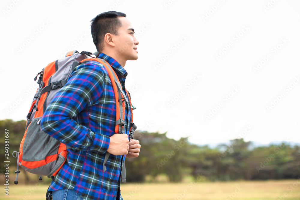 Traveler young Man with backpack looking forward Traveler young Man with backpack looking forward