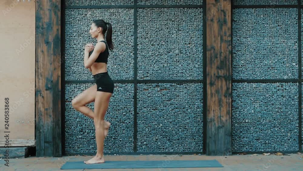 Young beautiful woman practicing yoga. Wellness concept. Calmness and relax, woman happiness. Toned picture