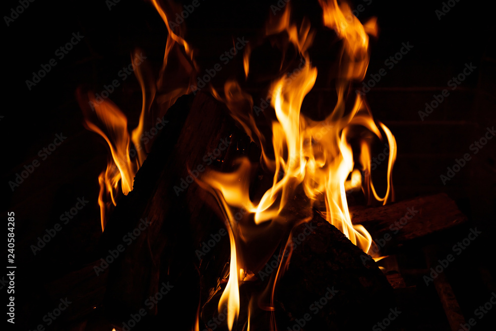 Cozy fireplace. Wood logs burning, relaxation and warm home Cozy fireplace. Wood logs burning, relaxation and warm home