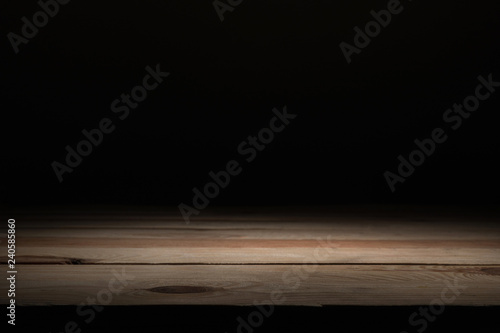 brown striped wooden surface on black