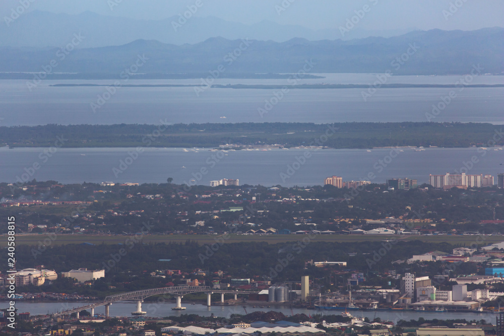 overview seightseeing point Tops Cebu City view to Cebu-Mandaue-Mactan-Olango with Mactan Bridge and Bohol in the Background