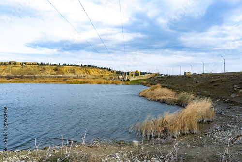 Abandoned water reservoire near the river.  photo