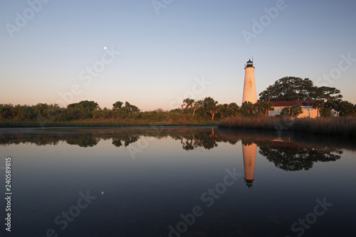Moon set at St. Marks Lighthouse; St. Marks National Wildlife Refuge, Florida