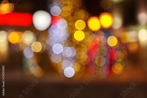Blurred background of colored lights. Image of abstract blurred bokeh background with warm colorful lights. Christmas lights, blur, bokeh, bokeh lights, bokeh background