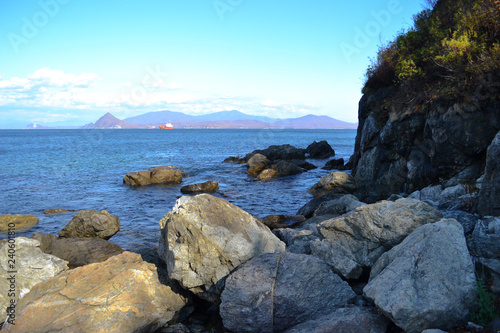 Far Eastern seascape, the city of Nakhodka, large stones on the shore of the Sea of Japan