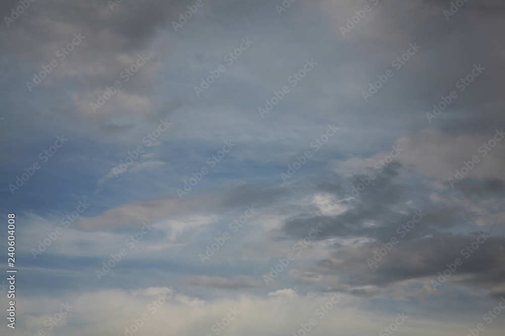 Clouds and sky fluffy and light as air. The beautiful background on the picture of the horizon is painted in blue. The best clouds. Clouds and sky fluffy and light as air. The beautiful background on the picture of the horizon is painted in blue. The best clouds.